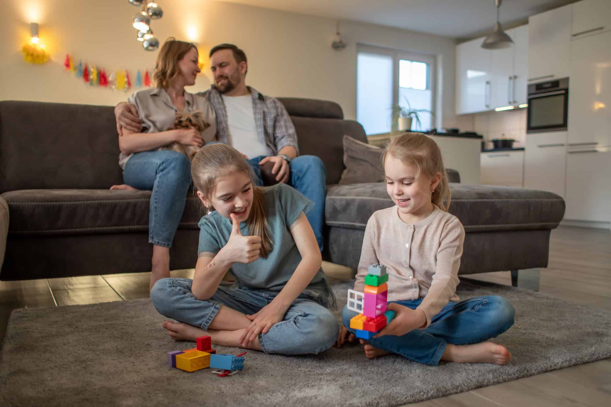 Parents watching children play
