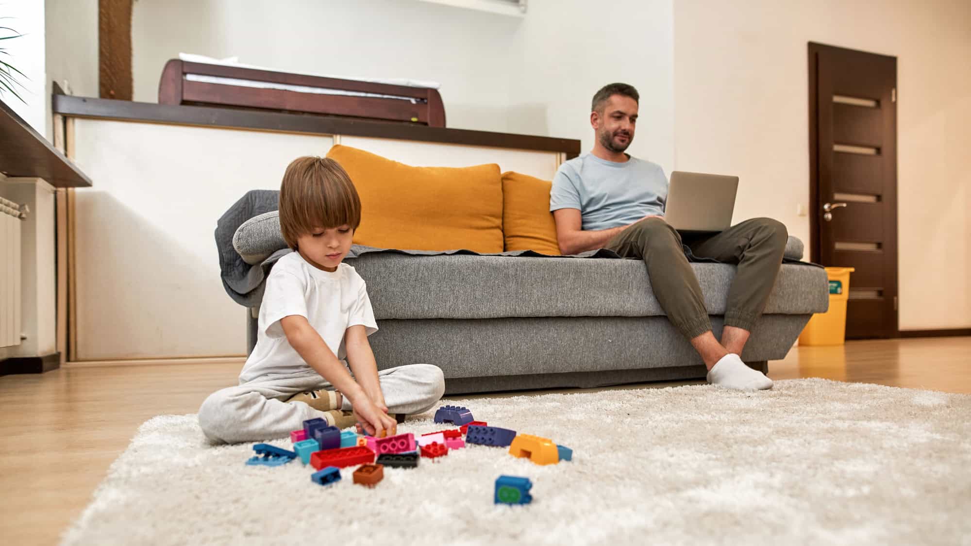 Father and child at home